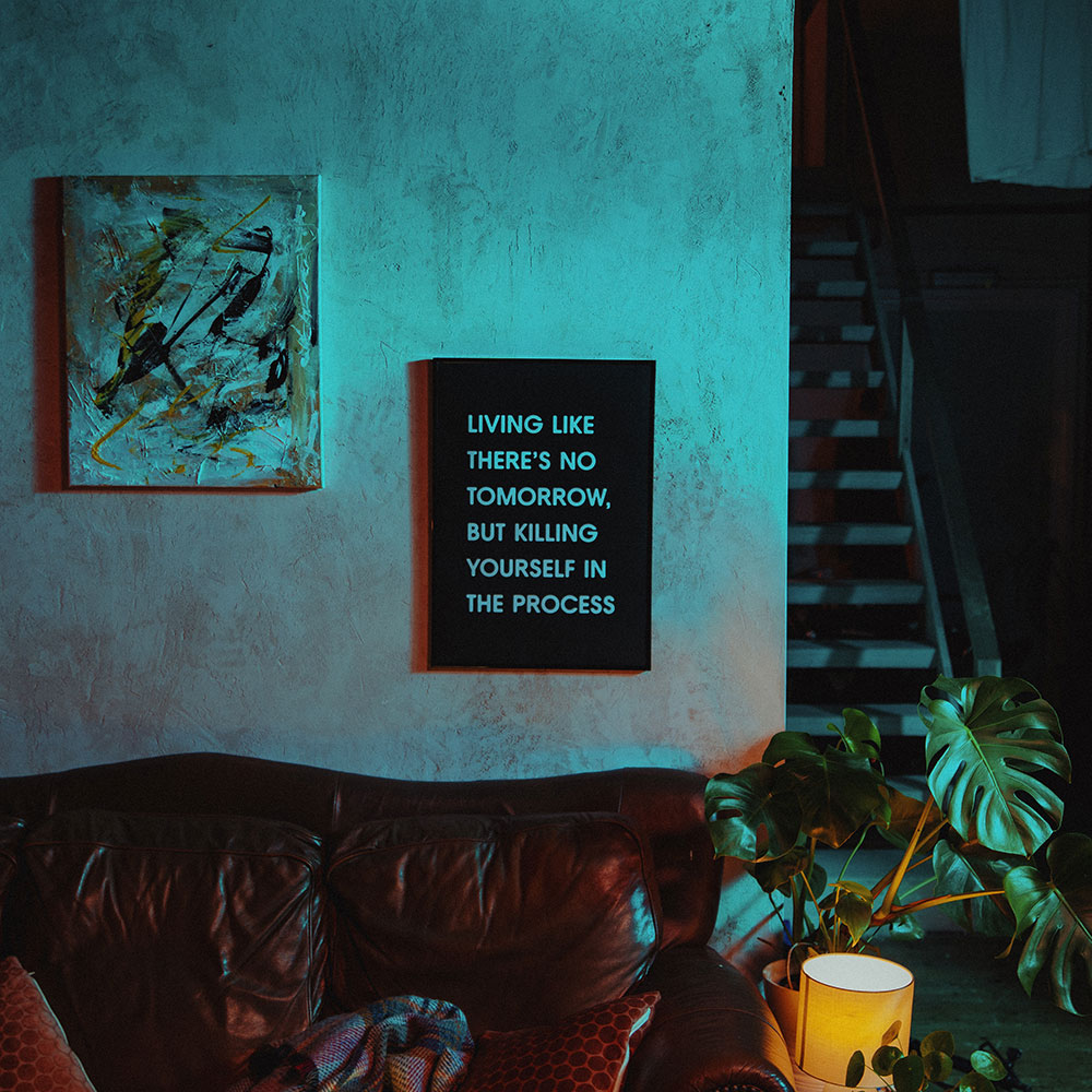 Behind the scenes of Laurence Guy’s album shoot — sofa and framed album title